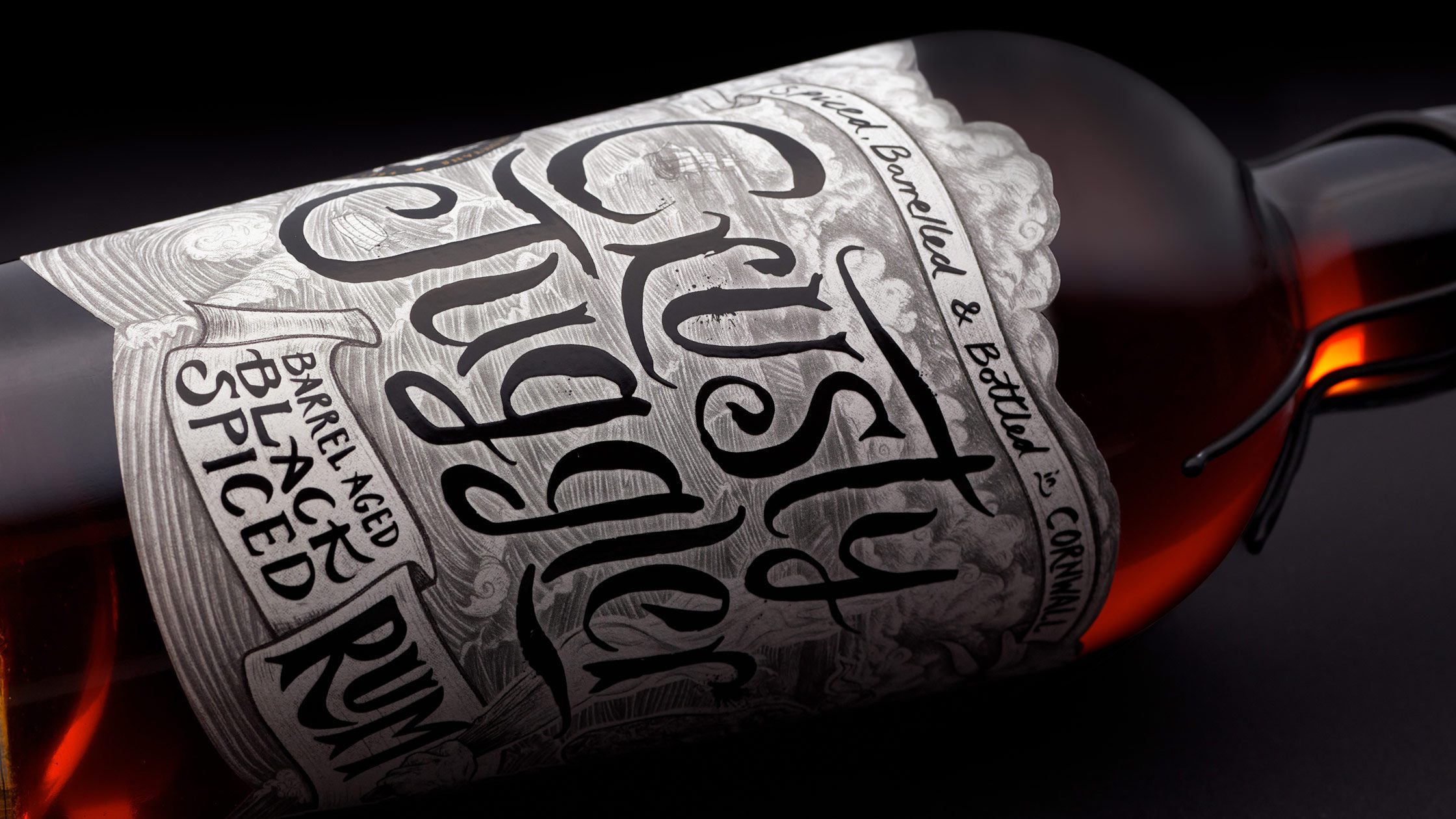 Spiced rum branding for Crusty Juggler by Kingdom & Sparrow